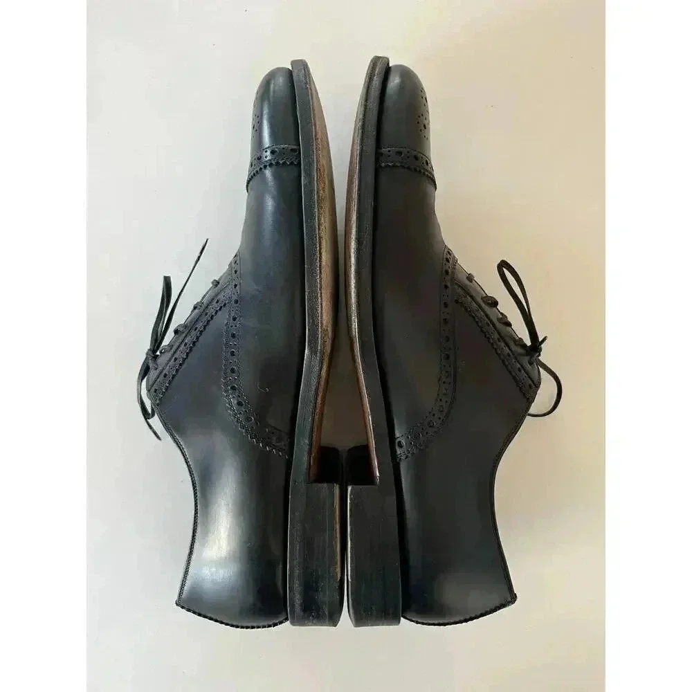 Salvatore Ferragamo Black Leather Wingtip Oxfords